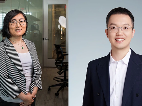 Two people smiles for a photo. There is a woman on the left and a man on the right.