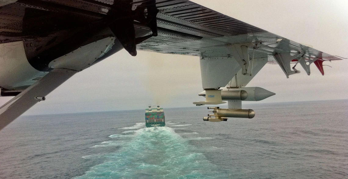 view of ship and ocean from plane